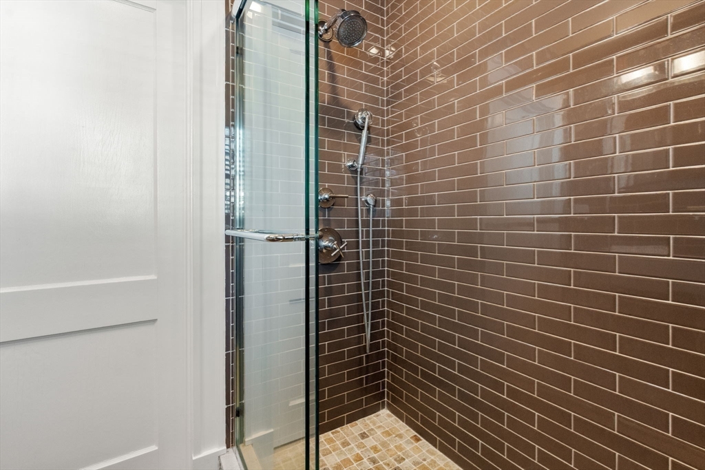 23 Newman Way, Unit 1 Arlington, MA 02476 - Photo 19 of 28 a bathroom with a shower