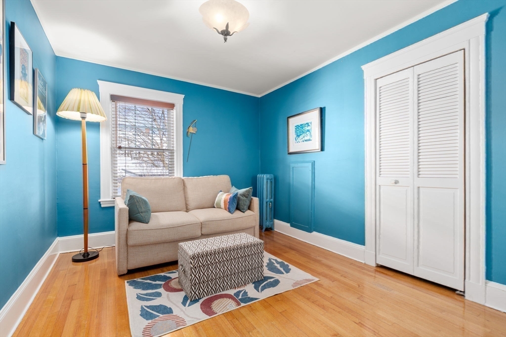 23 Newman Way, Unit 1 Arlington, MA 02476 - Photo 23 of 28 a living room with furniture and a window