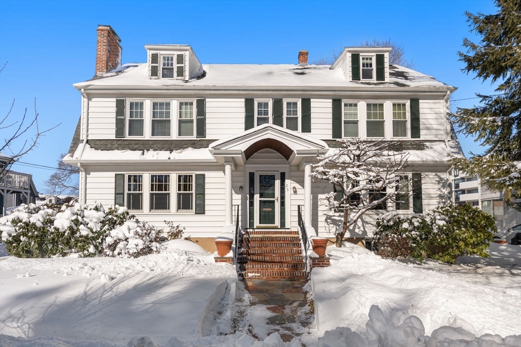 23 Newman Way, Unit 1 Arlington, MA 02476 - Photo 26 of 28 a front view of a house with a yard