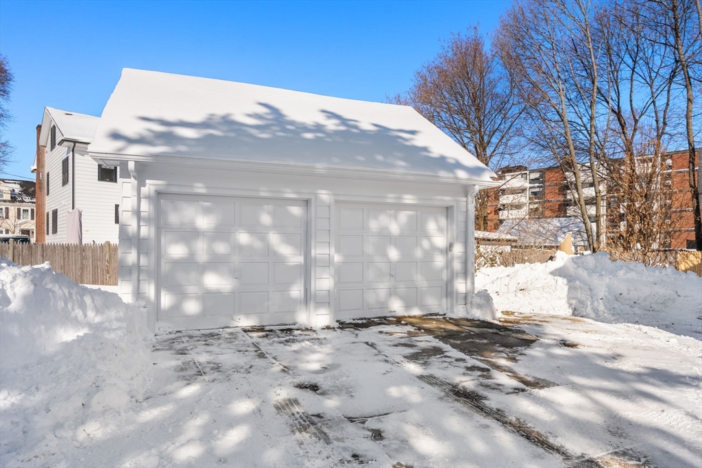 23 Newman Way, Unit 1 Arlington, MA 02476 - Photo 28 of 28 a view of a road with a snow in the background
