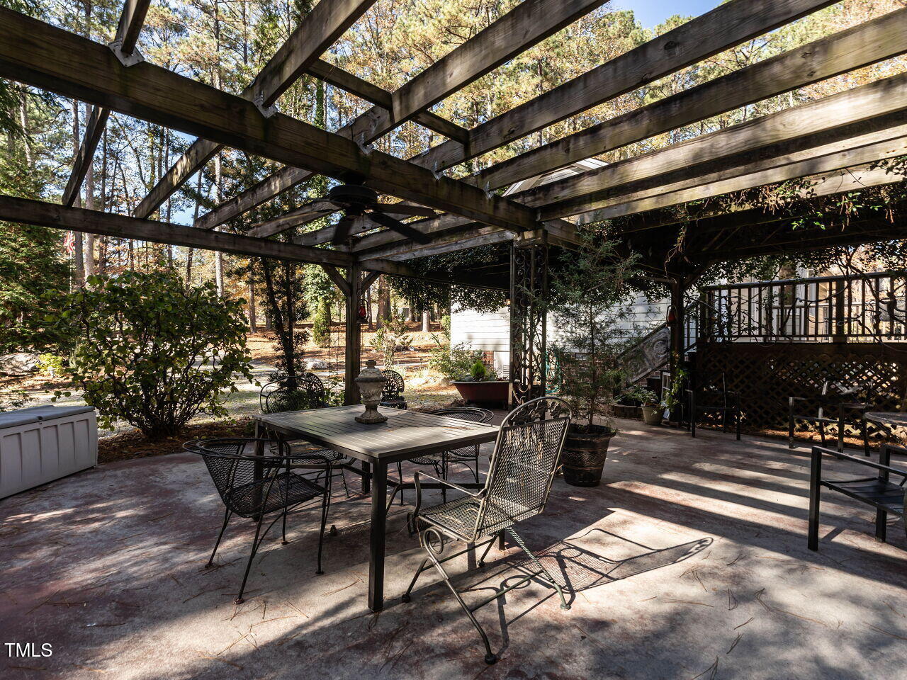 5313 Pine Drive Raleigh, NC 27606 - Photo 27 of 34 a view of a porch with furniture and a yard