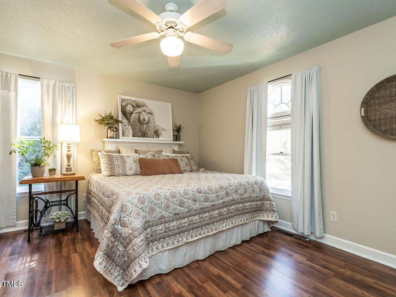 5313 Pine Drive Raleigh, NC 27606 - Photo 3 of 34 a bedroom with a bed and a table in it