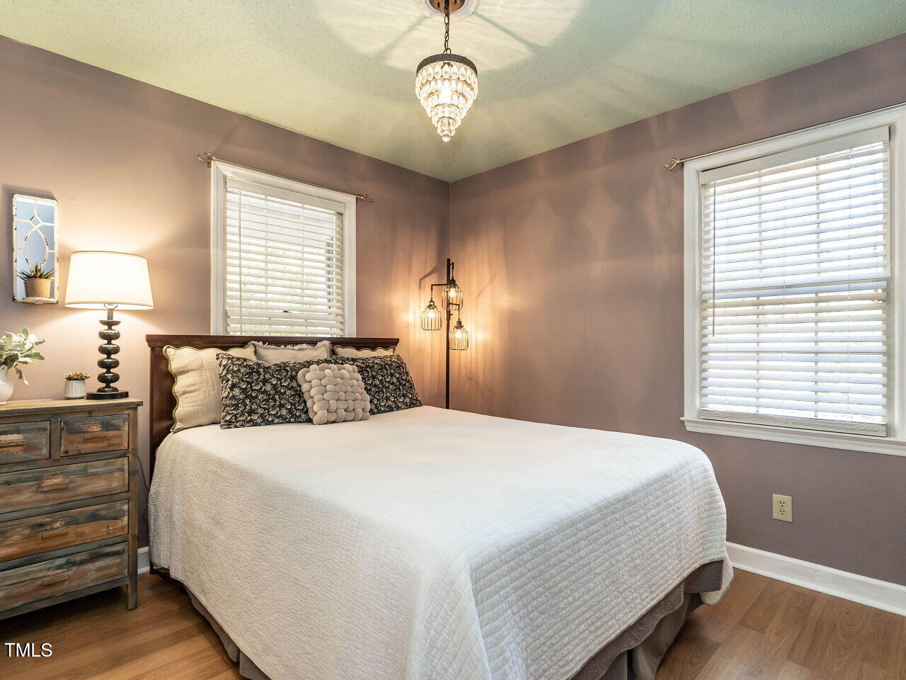 5313 Pine Drive Raleigh, NC 27606 - Photo 8 of 34 a bedroom with a bed and a window