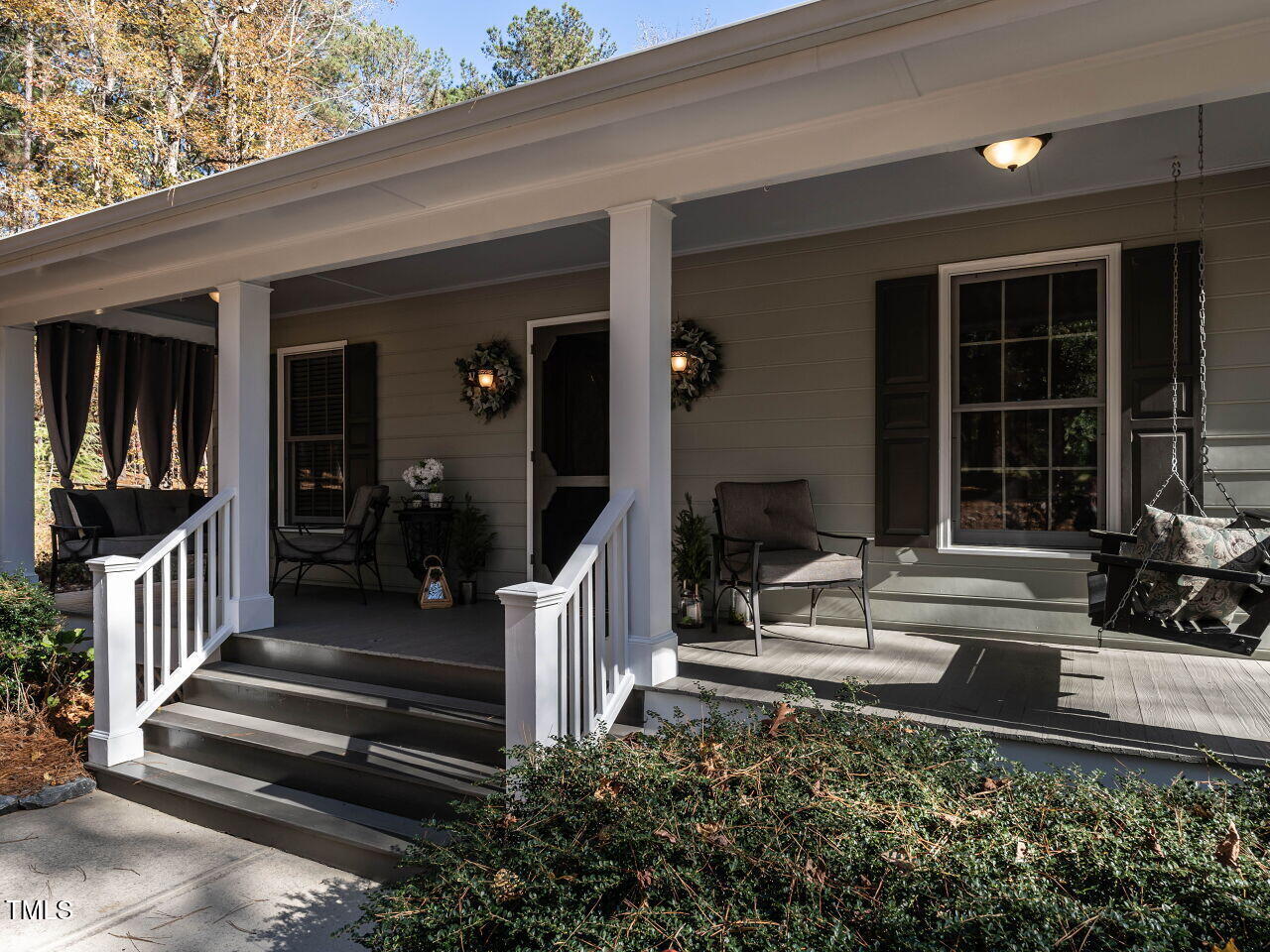 5313 Pine Drive Raleigh, NC 27606 - Photo 9 of 34 a front view of a house with a porch