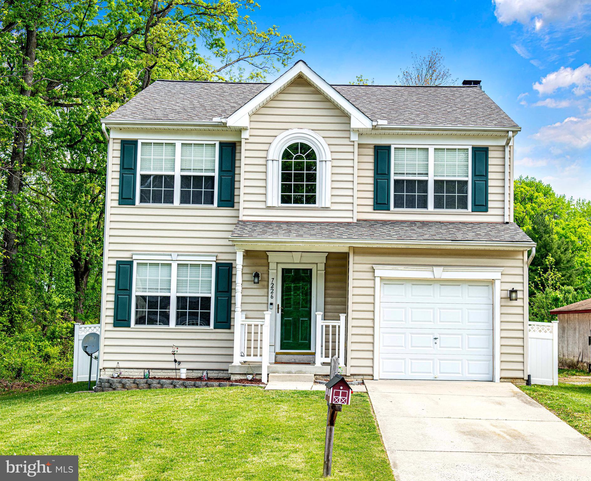 7226 Orth Road Sparrows Point, MD 21219 - Photo 21 of 51 a front view of a house with a yard