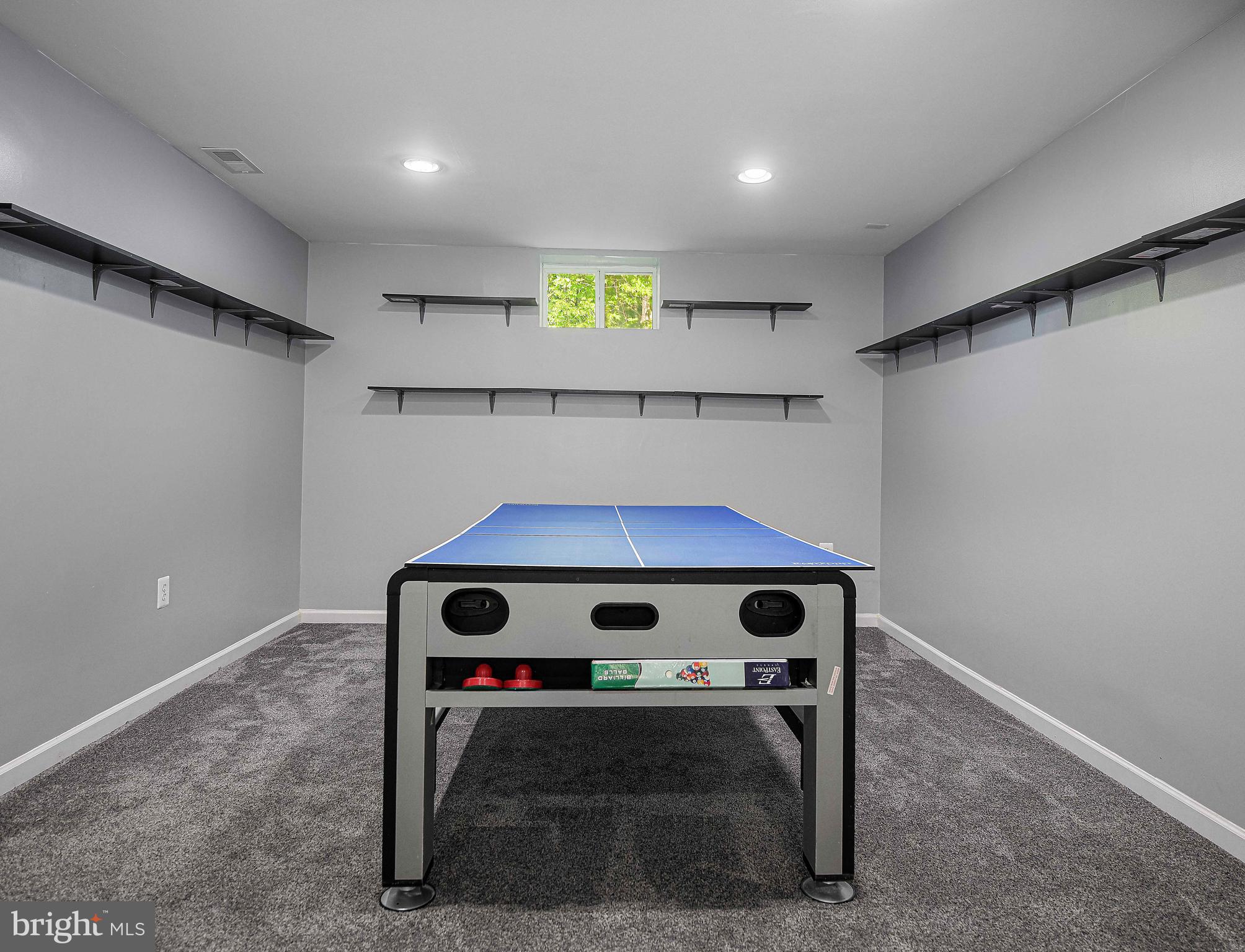 7226 Orth Road Sparrows Point, MD 21219 - Photo 29 of 51 a room with furniture and a window