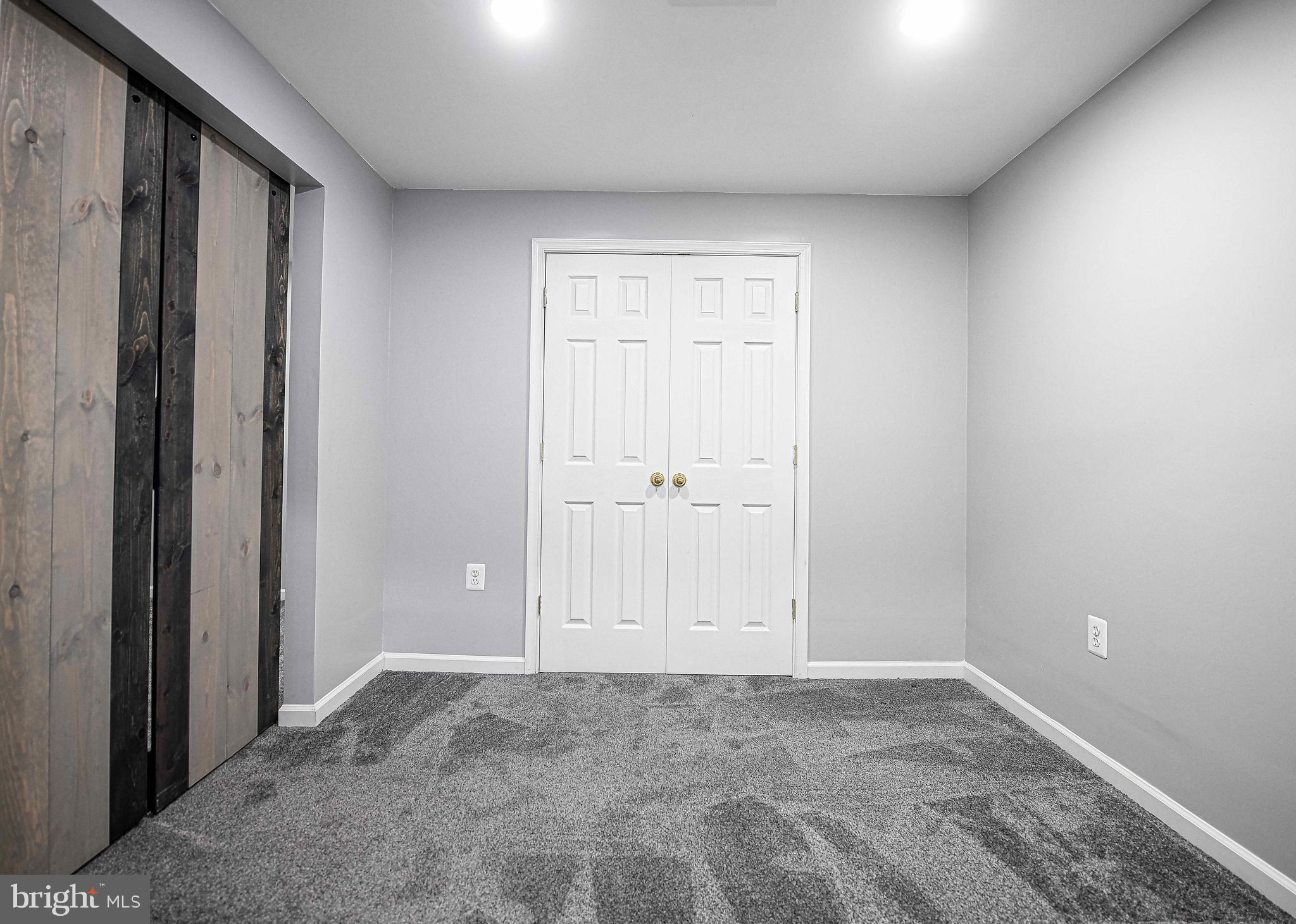 7226 Orth Road Sparrows Point, MD 21219 - Photo 31 of 51 an empty room with white wall and shower