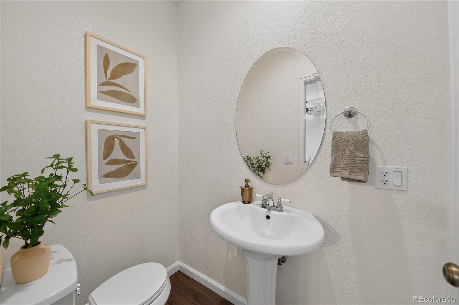 665 Kilmer Street Golden, CO 80401 - Photo 19 of 35 a bathroom with a sink mirror and toilet