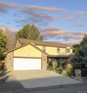 a view of a swimming pool with a yard