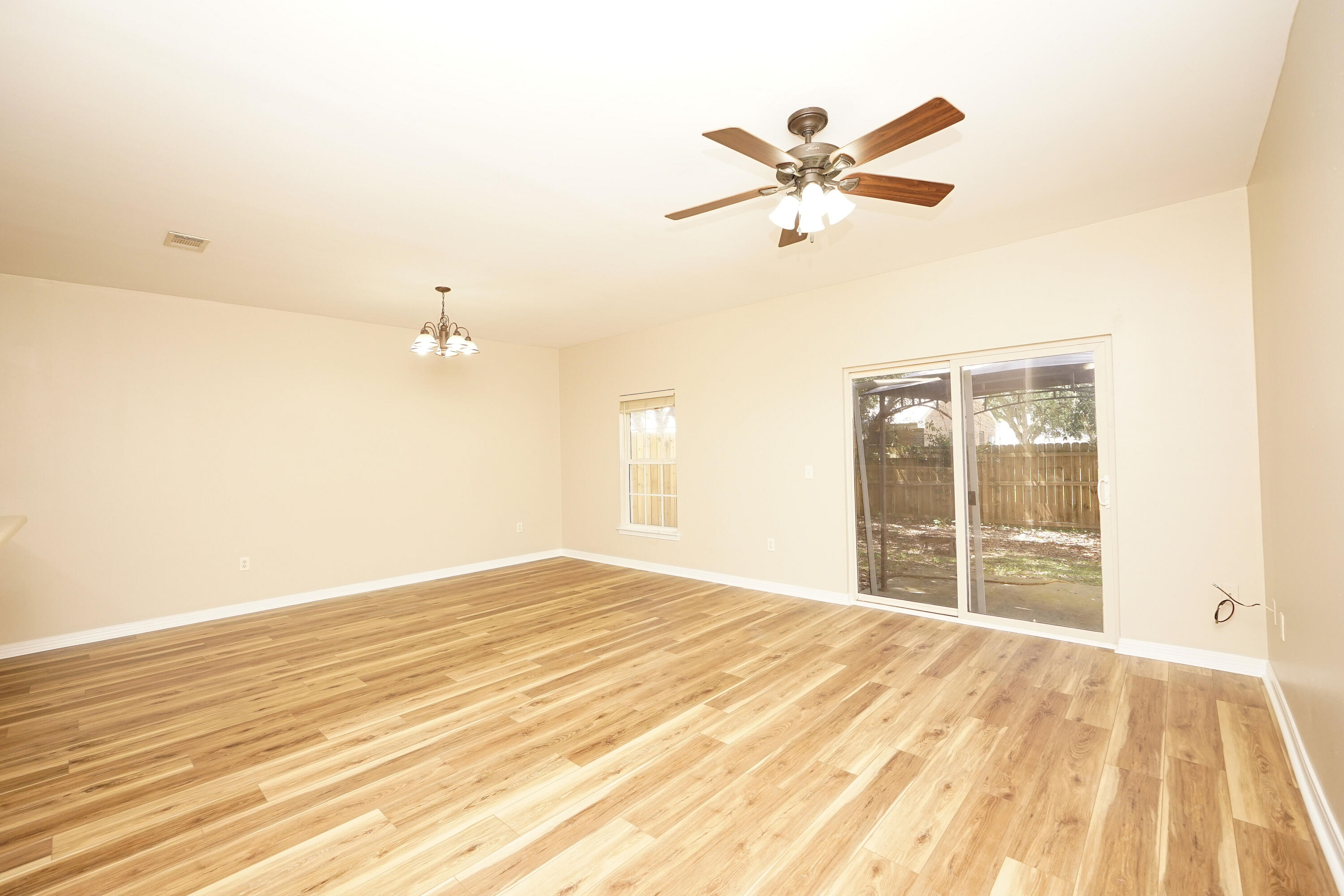 1417 Beaver Run Road, Unit 9 Niceville, FL 32578 - Photo 5 of 20 Sliding glass doors to back patio