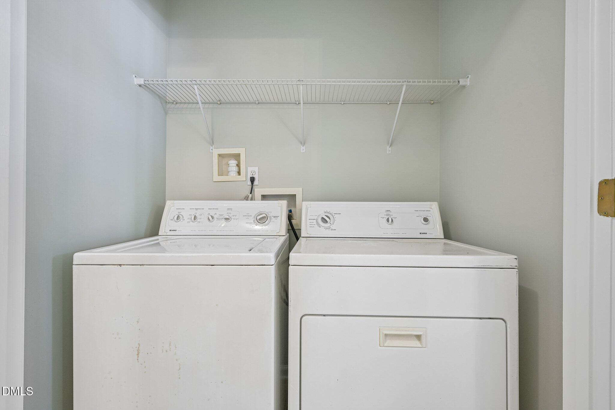 278 South Raleigh Street Angier, NC 27501 - Photo 29 of 35 a utility room with dryer and washer