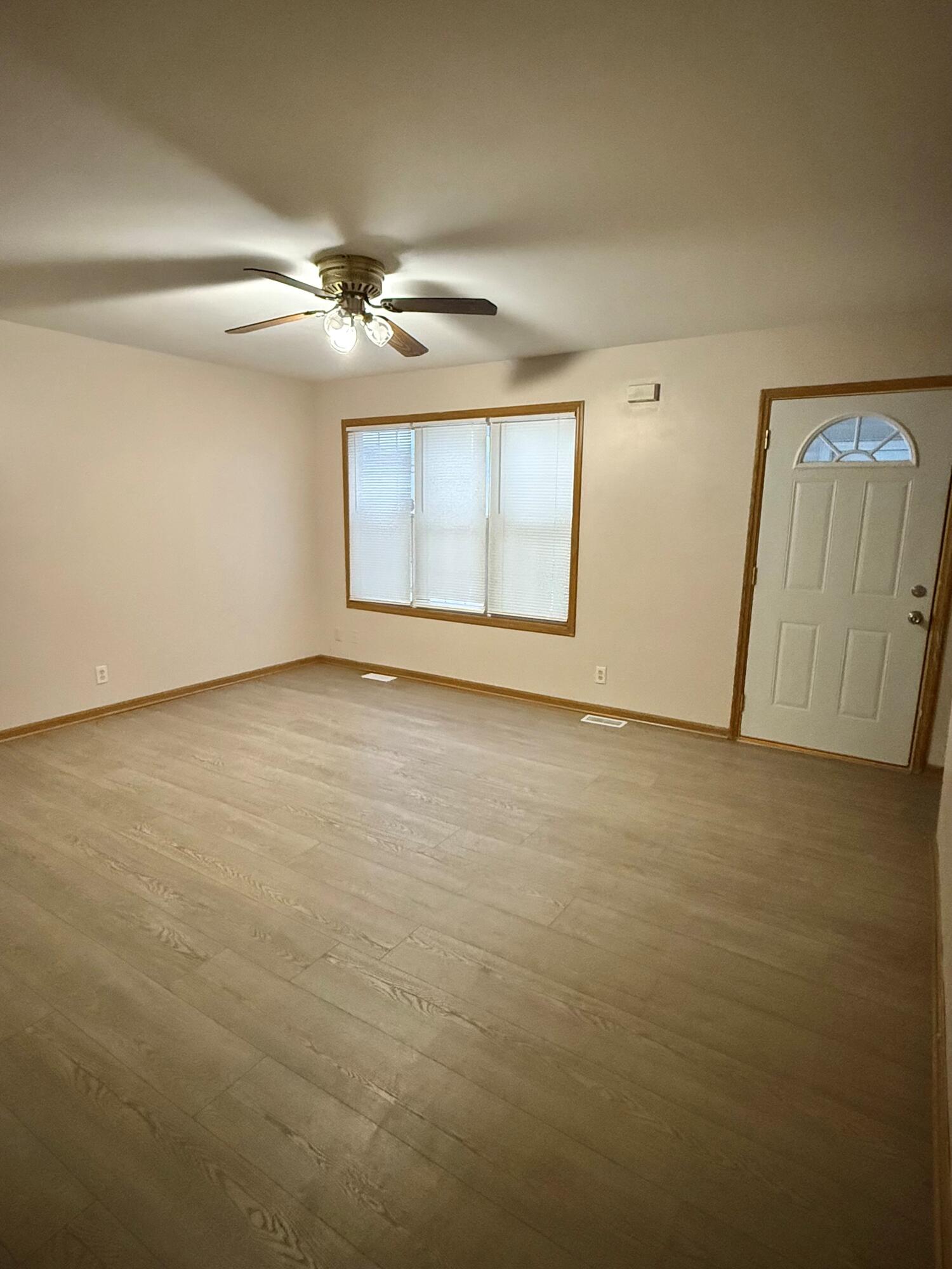 395 Plymouth Road, Unit B Valparaiso, IN 46385 - Photo 2 of 8 an empty room with windows and closet