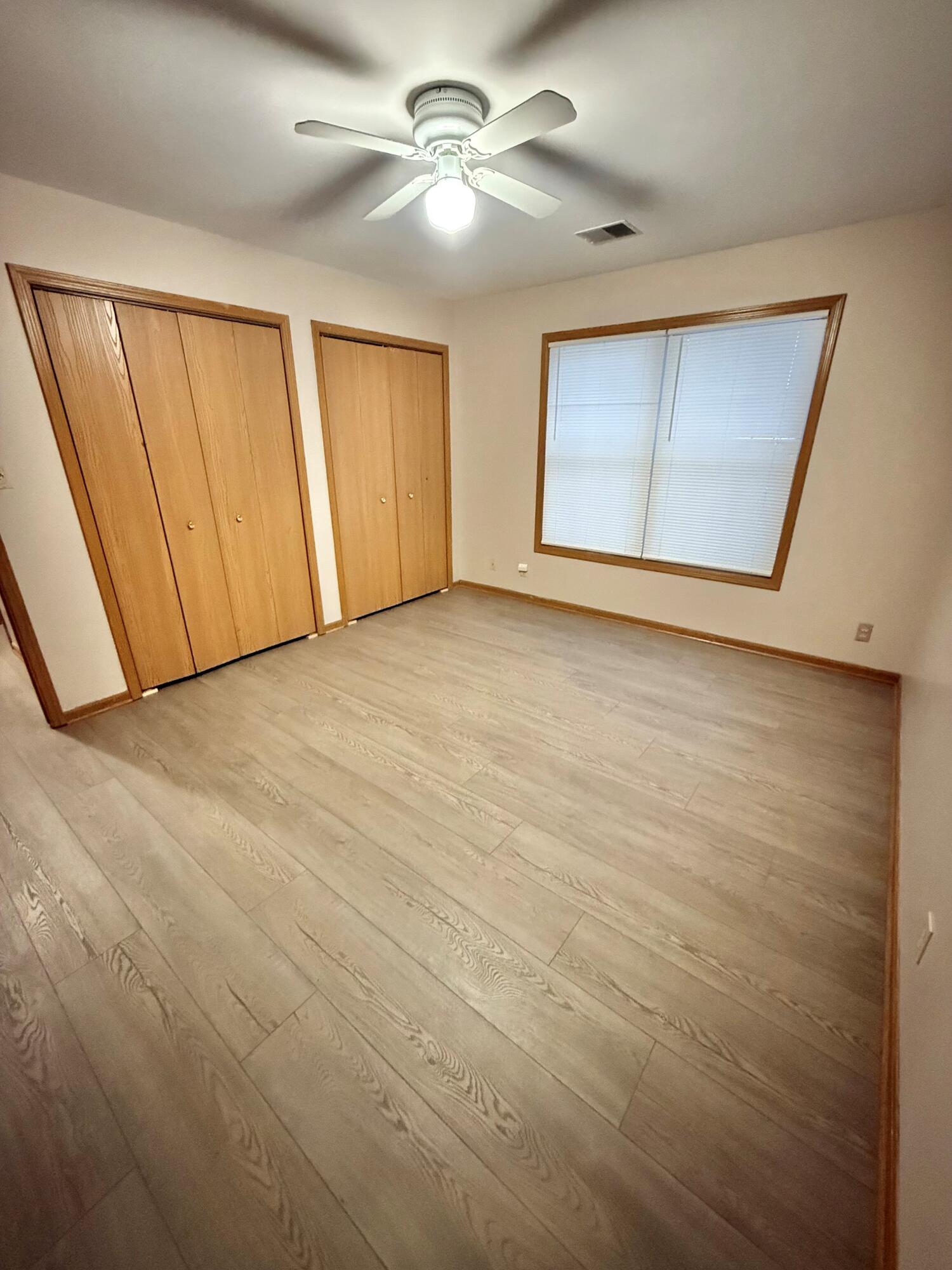 395 Plymouth Road, Unit B Valparaiso, IN 46385 - Photo 5 of 8 a view of an empty room with a window