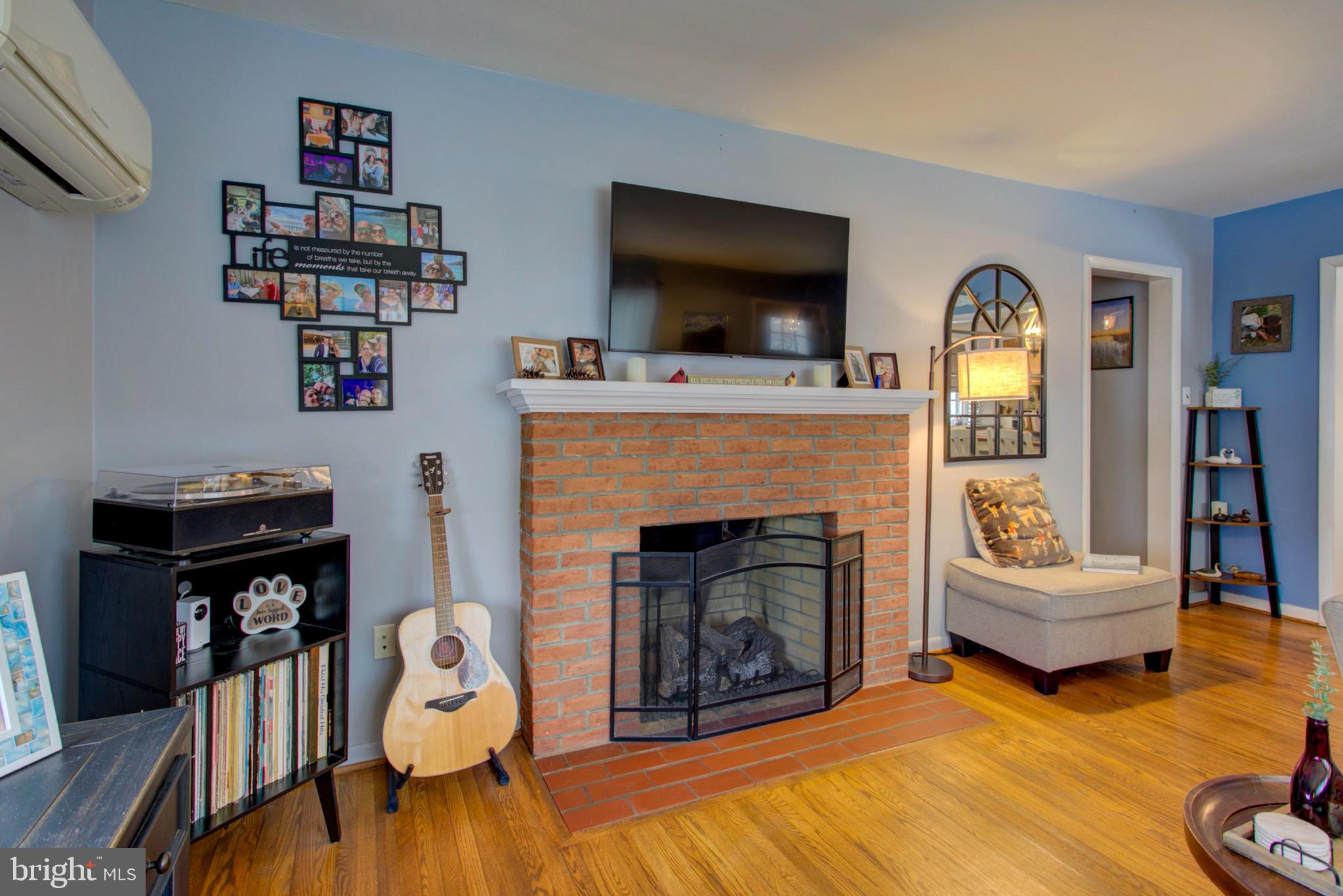 825 Robin Road Lancaster, PA 17601 - Photo 7 of 32 Wood burning fireplace in living room