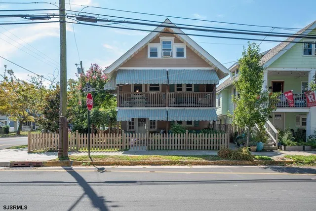 a front view of a house with a porch
