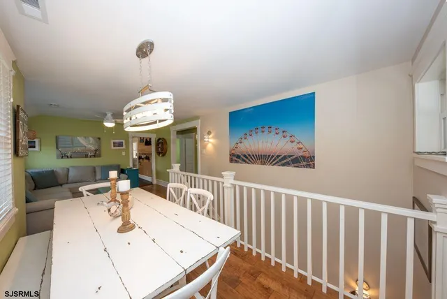 a view of a dining room and a chandelier
