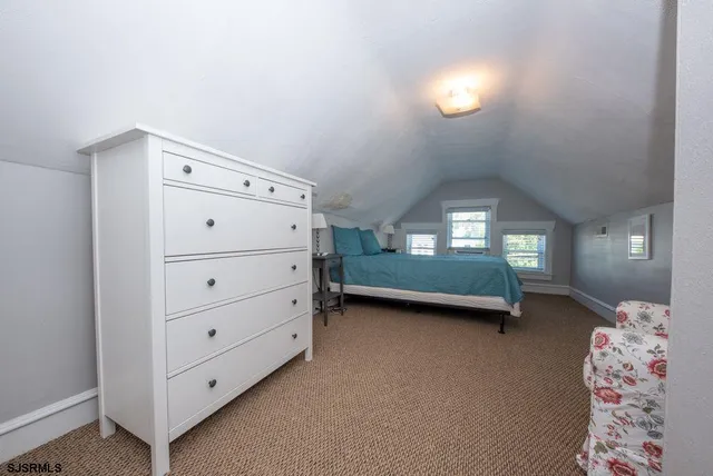 a view of a hallway with closet