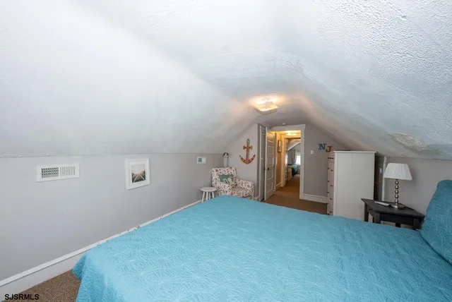 a view of a livingroom with a staircase