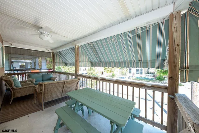 a room with furniture and a window