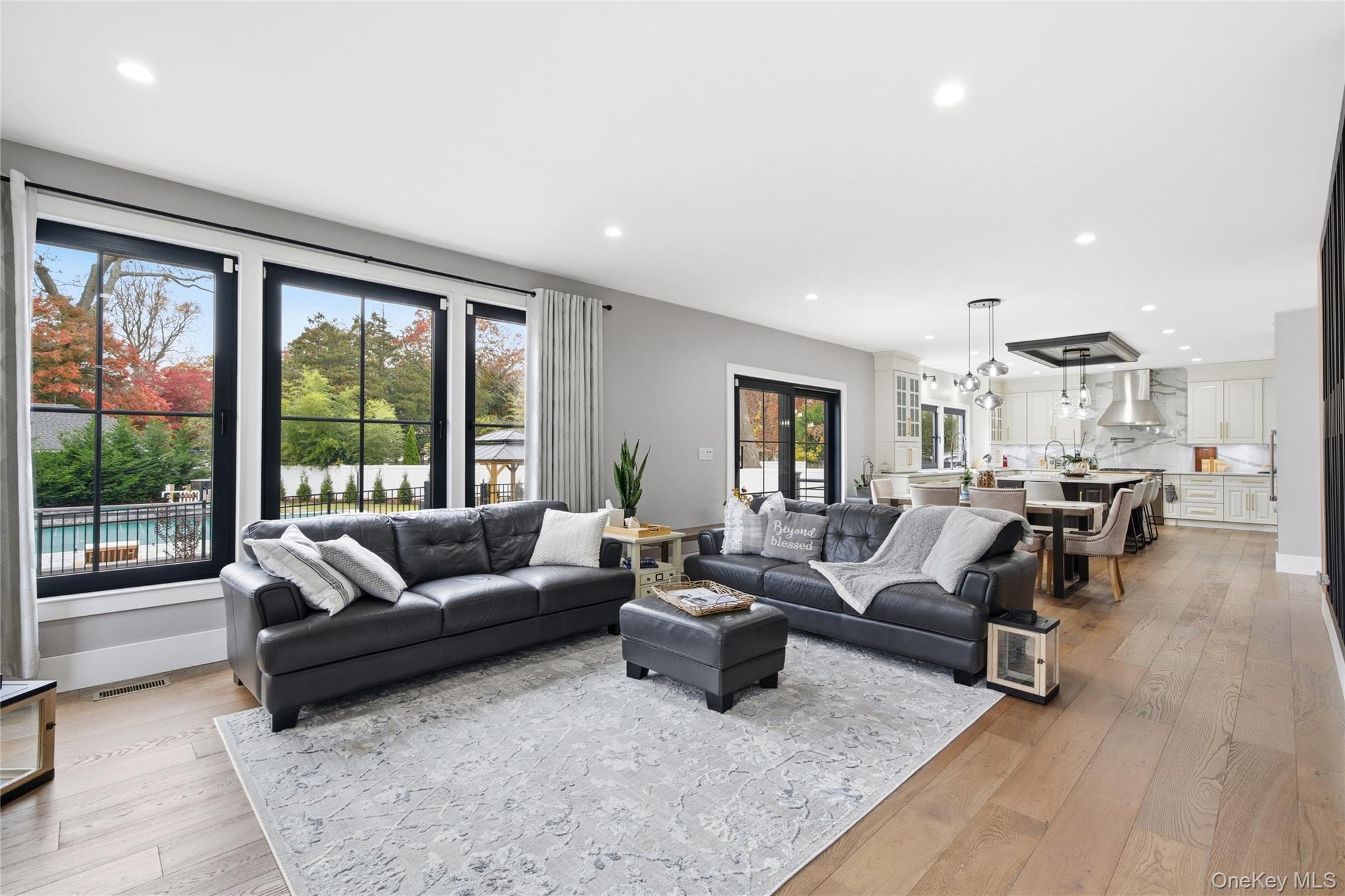 18 Timber Point Road East Islip, NY 11730 - Photo 13 of 34 a living room with furniture and a large window