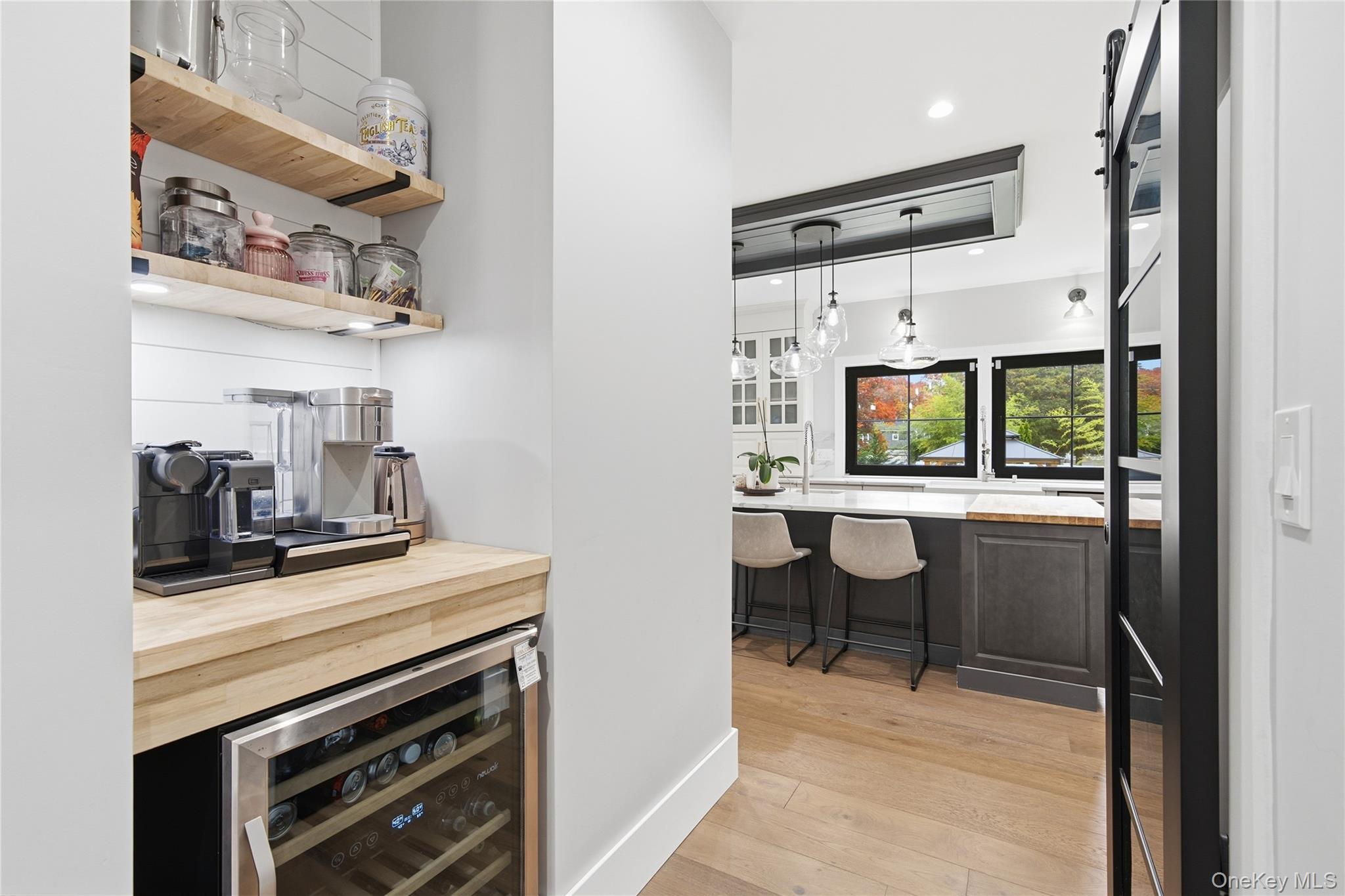18 Timber Point Road East Islip, NY 11730 - Photo 17 of 34 a kitchen with stainless steel appliances a stove and a microwave