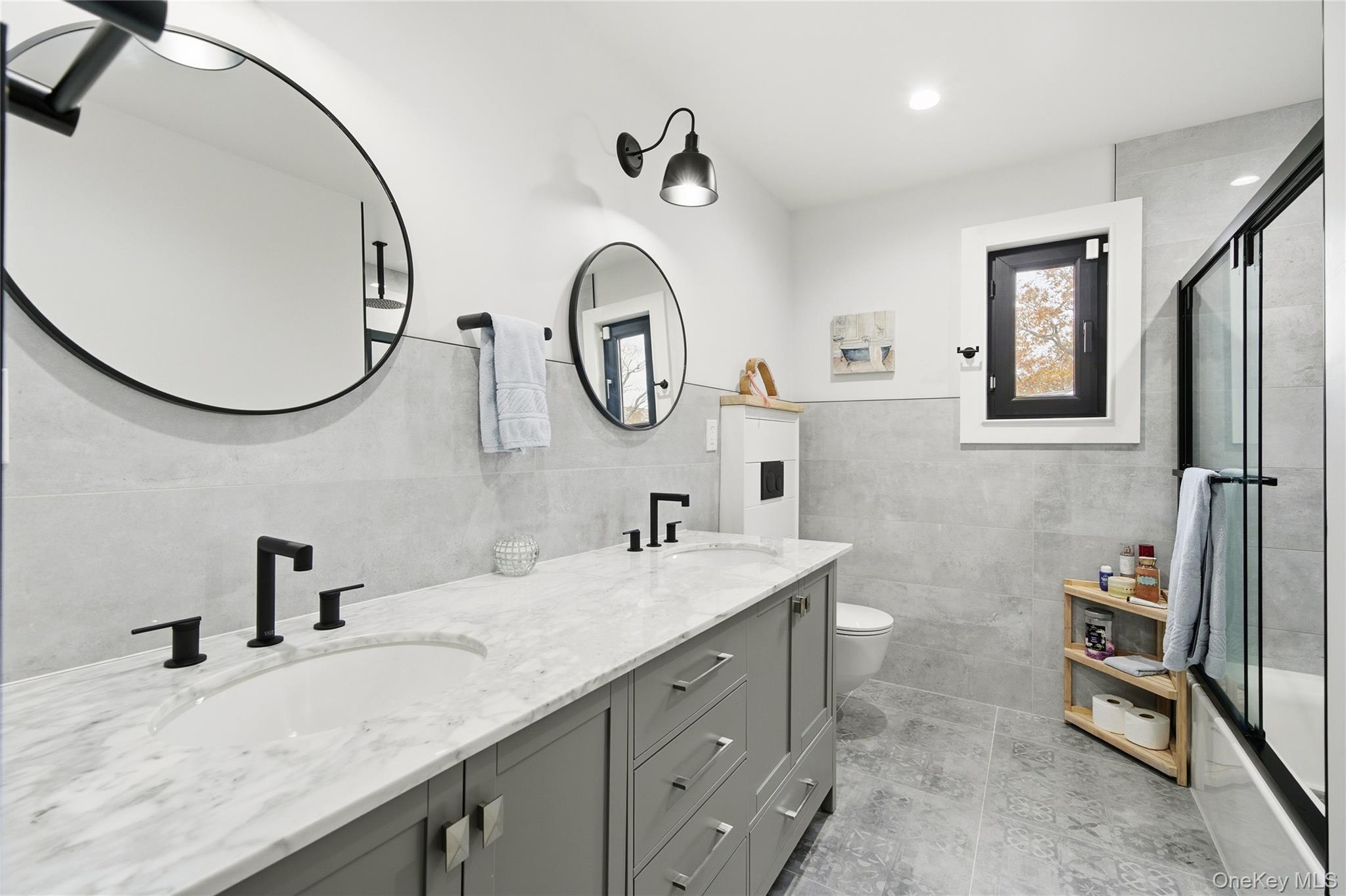 18 Timber Point Road East Islip, NY 11730 - Photo 26 of 34 a bathroom with a granite countertop sink and a mirror