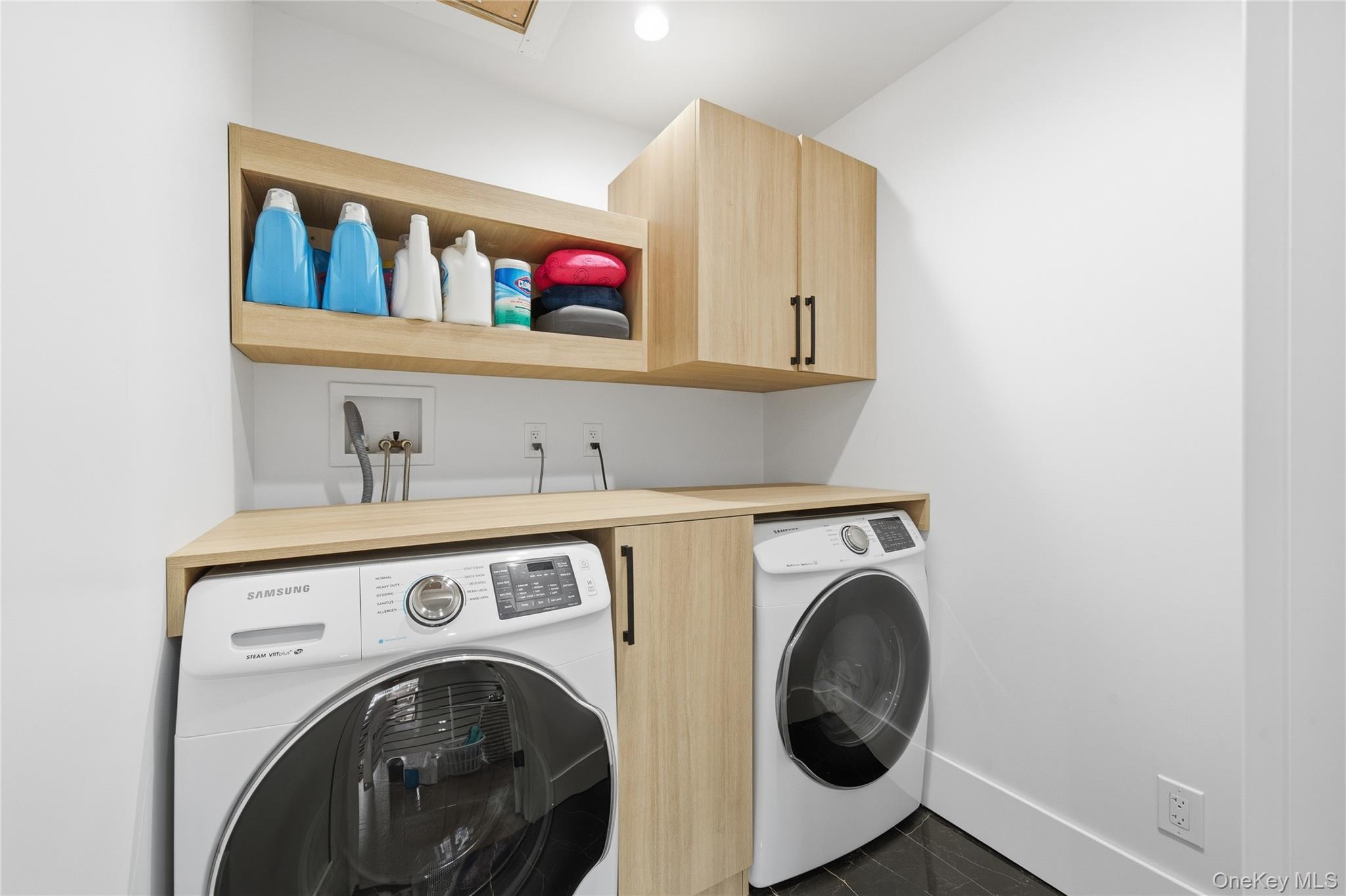18 Timber Point Road East Islip, NY 11730 - Photo 27 of 34 a utility room with dryer and washer