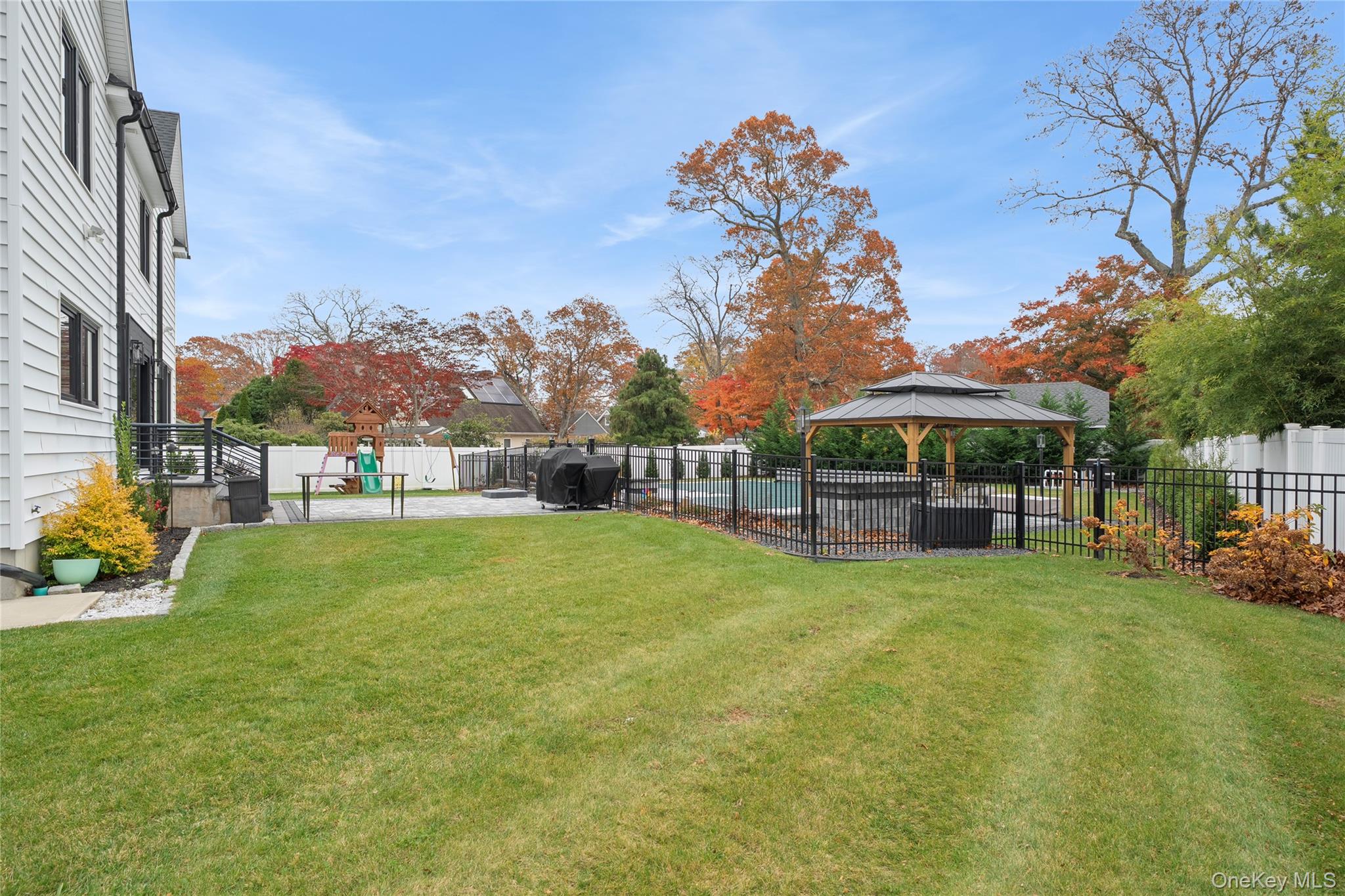 18 Timber Point Road East Islip, NY 11730 - Photo 30 of 34 a view of outdoor space with garden and deck