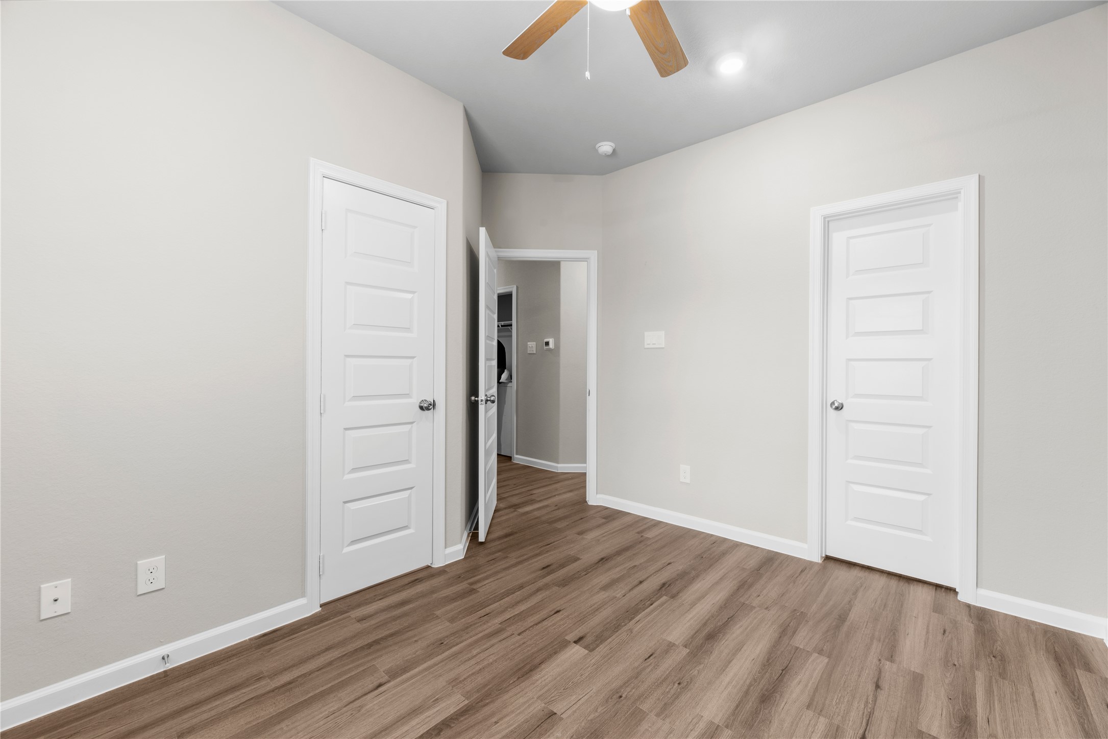 8161 Tate Street, Unit B Houston, TX 77028 - Photo 11 of 14 an empty room with wooden floor and closet