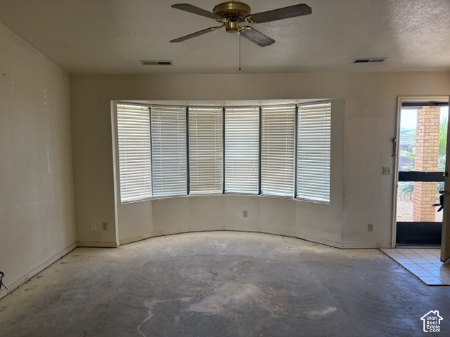 2164 West 2000 North St. George, UT 84770 - Photo 4 of 26 Ceiling fan fixture and large bay window with blinds