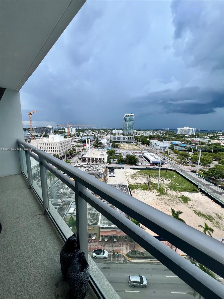 7135 Collins Avenue, Unit 1523 Miami Beach, FL 33141 - Photo 29 of 55 a view of swimming pool with a balcony