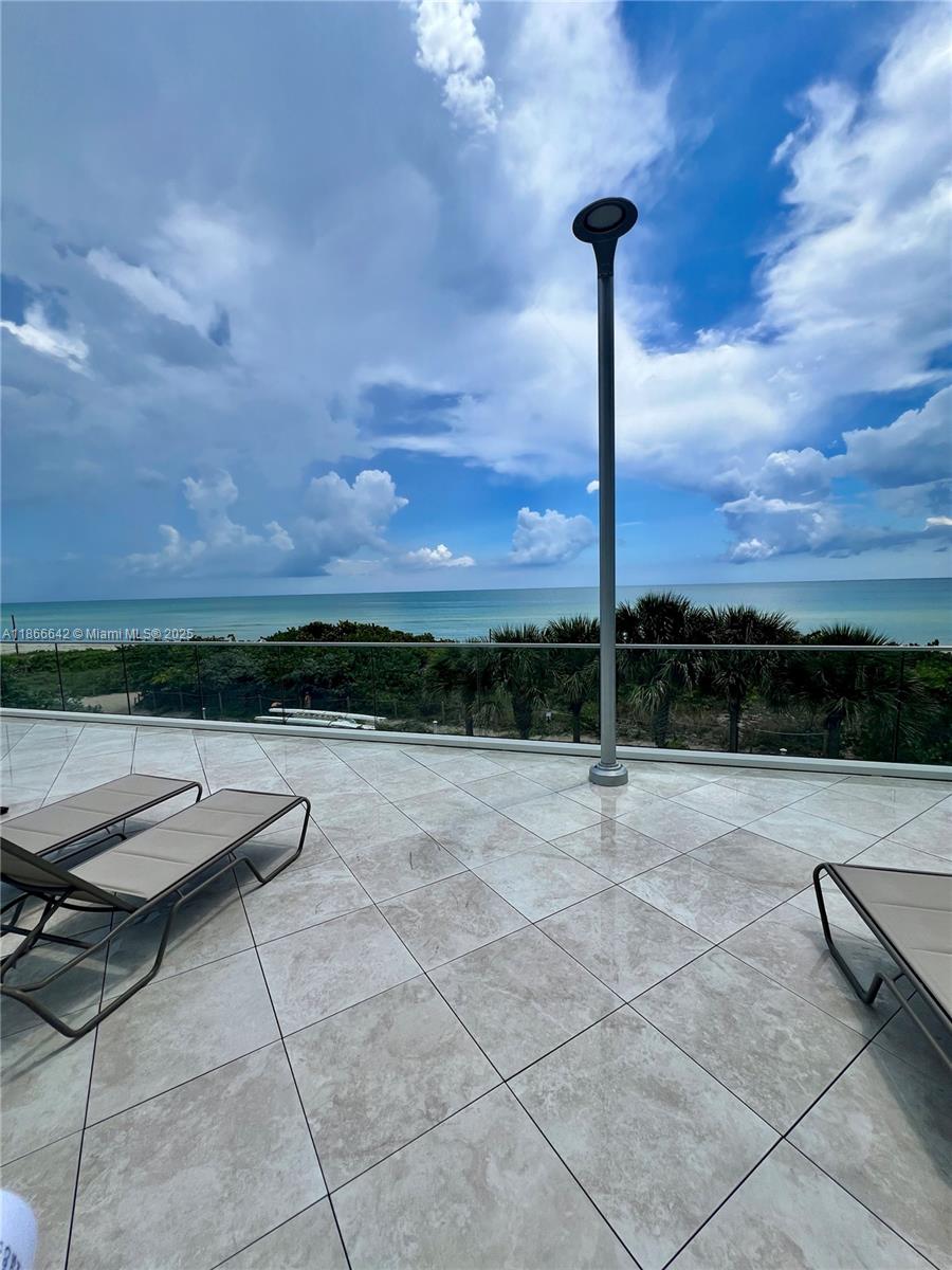 7135 Collins Avenue, Unit 1523 Miami Beach, FL 33141 - Photo 40 of 55 a view of a terrace with sky view