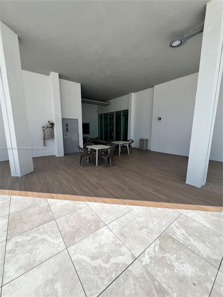 7135 Collins Avenue, Unit 1523 Miami Beach, FL 33141 - Photo 41 of 55 Pool Deck Dinning