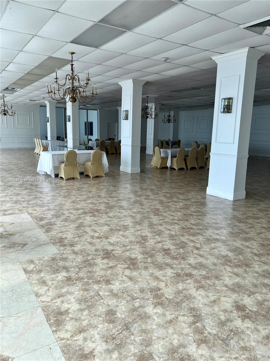 7135 Collins Avenue, Unit 1523 Miami Beach, FL 33141 - Photo 43 of 55 a living room with furniture