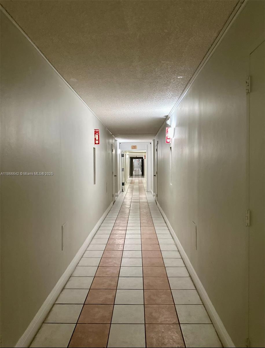 7135 Collins Avenue, Unit 1523 Miami Beach, FL 33141 - Photo 55 of 55 a view of gallery with wooden floor