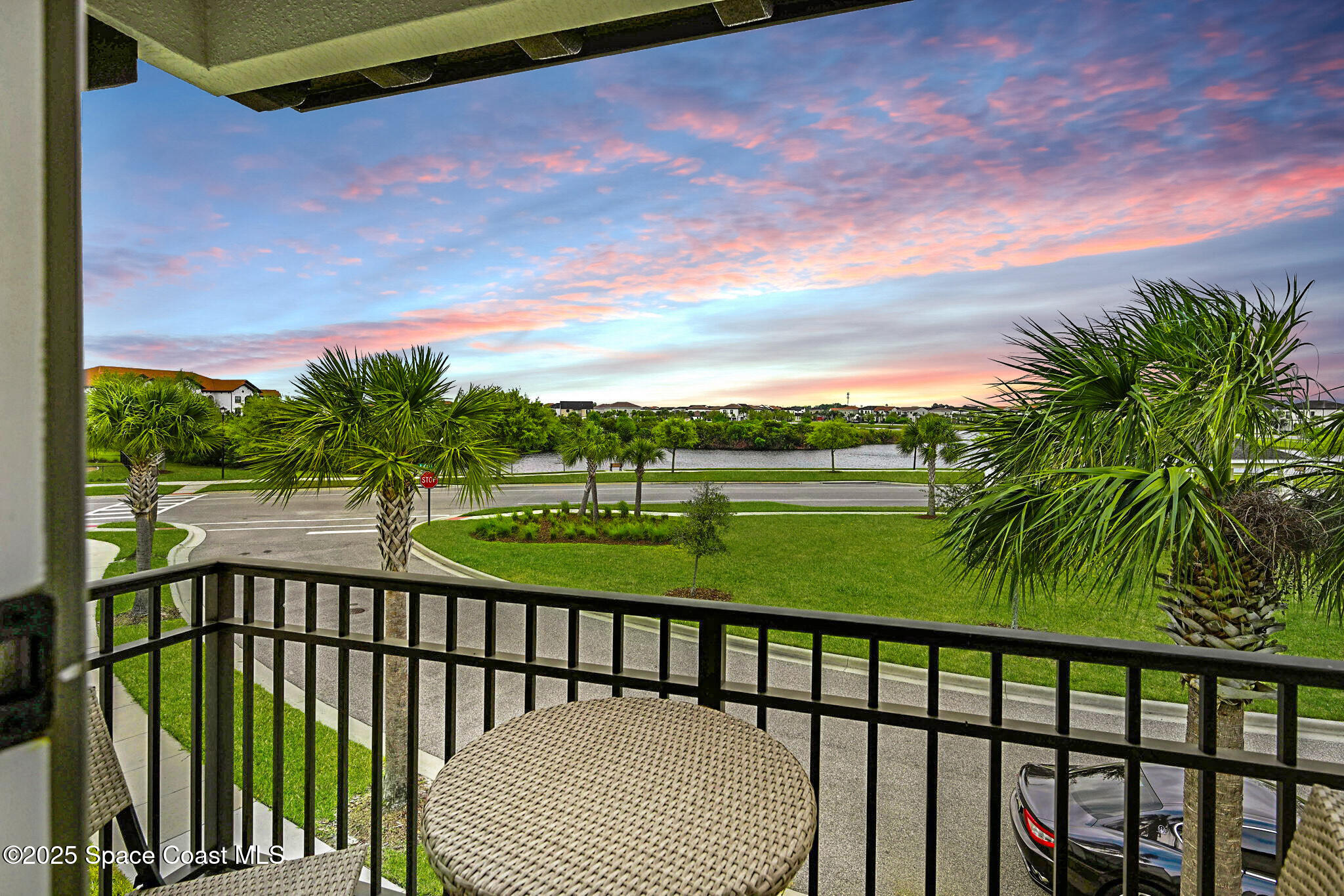 7072 Mercado Lane Melbourne, FL 32940 - Photo 2 of 32 a view of a street from a balcony