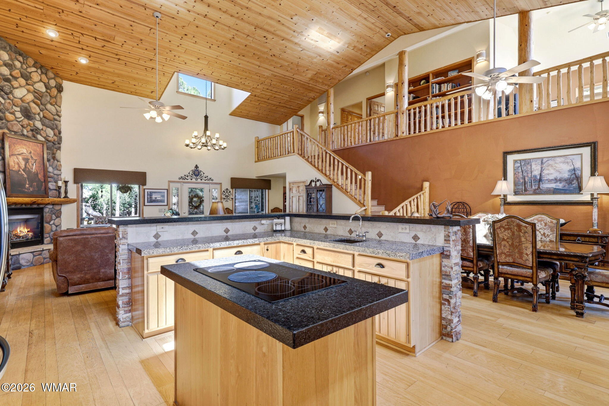 826 Pine Creek Circle Lakeside, AZ 85929 - Photo 7 of 65 a kitchen that has a lot of cabinets a sink and a stove in it