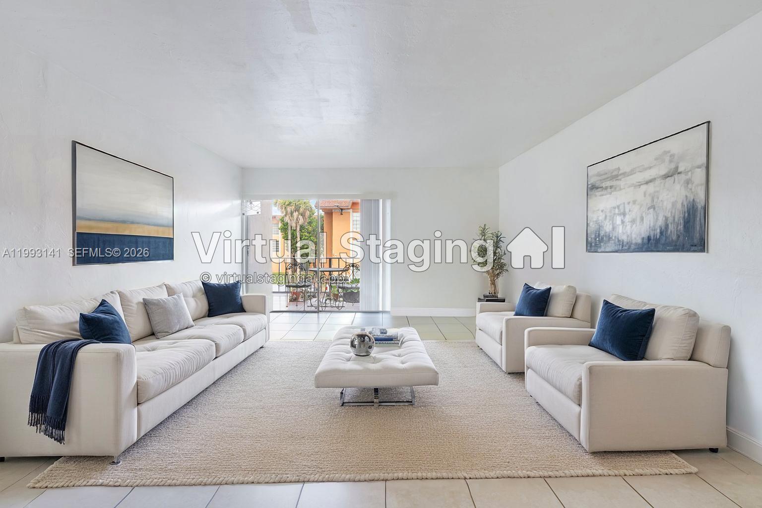 9423 Southwest 76th Street, Unit W21 Miami, FL 33173 - Photo 2 of 13 a living room with furniture and a large window