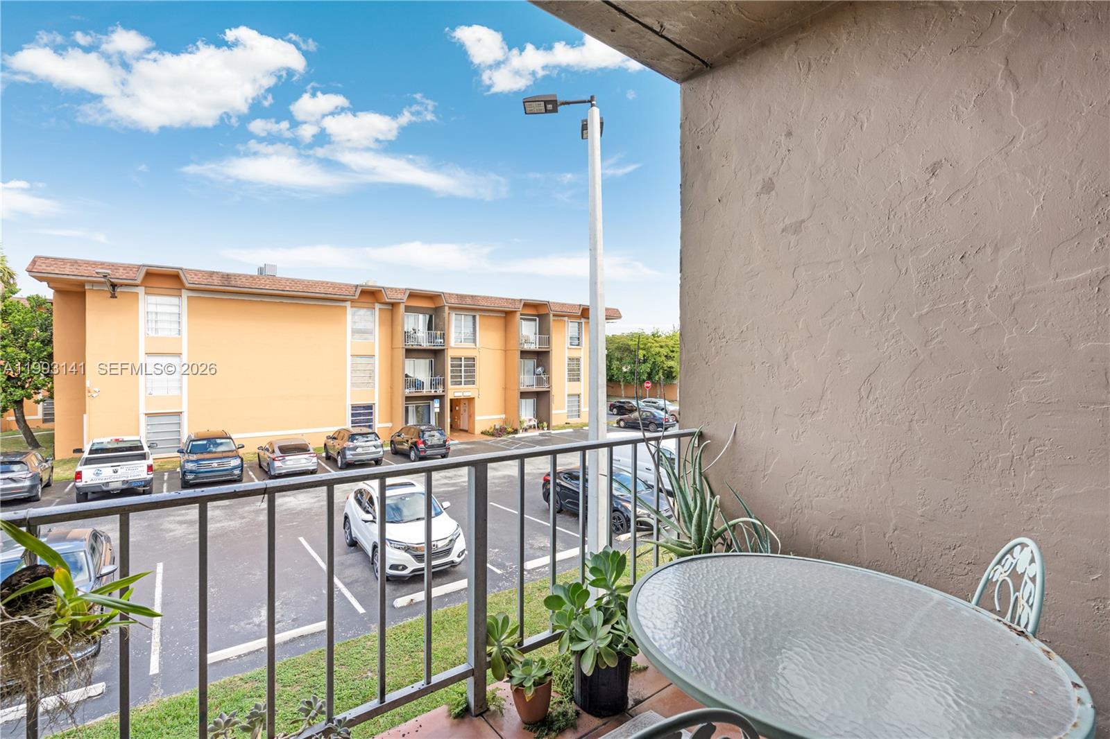 9423 Southwest 76th Street, Unit W21 Miami, FL 33173 - Photo 3 of 13 a view of a balcony