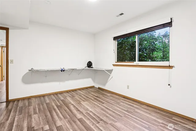 a view of a room with a large window