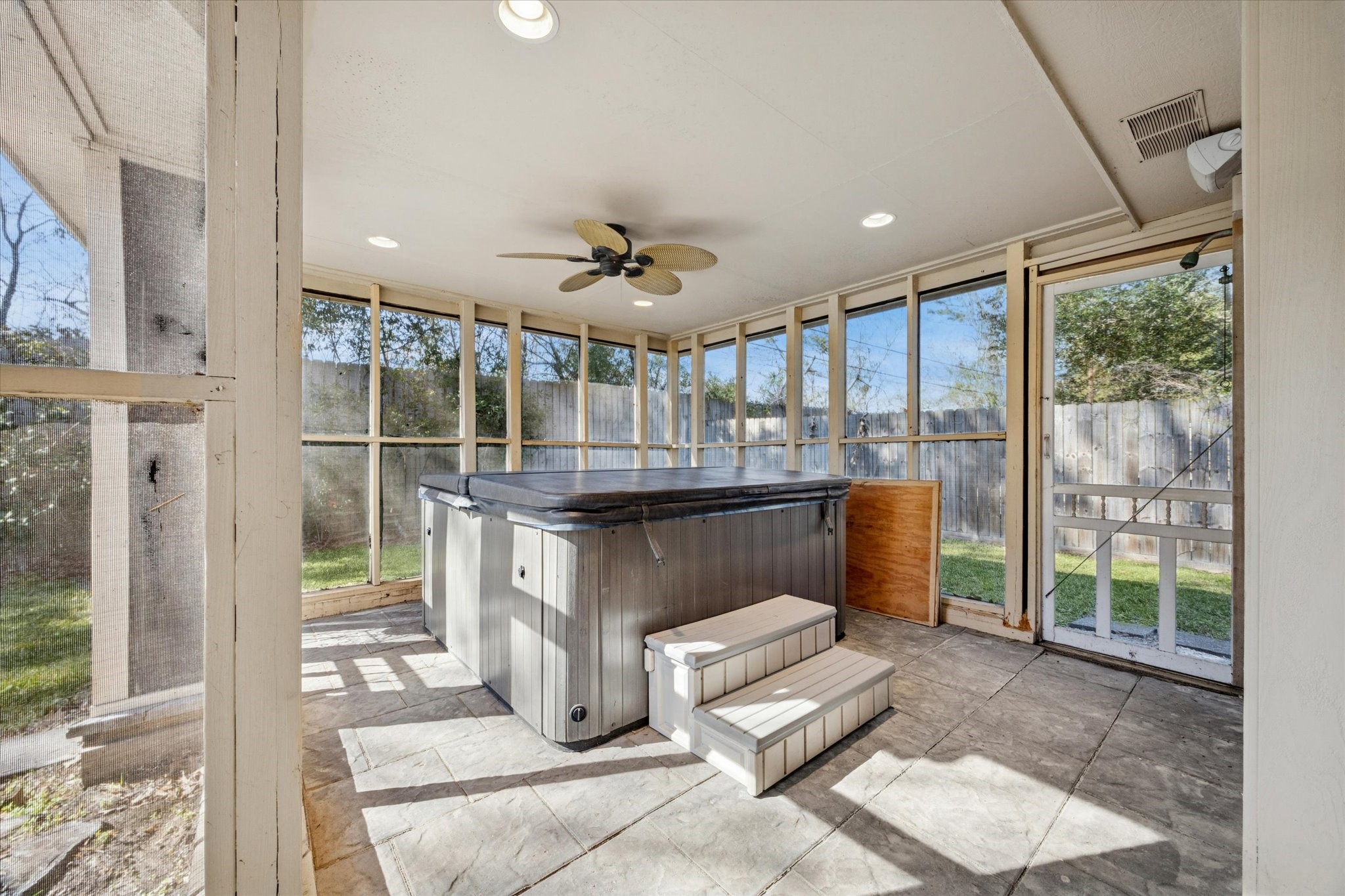 3830 Hansen Drive Dickinson, TX 77539 - Photo 11 of 21 Screened In Porch with Private HOT TUB off Primary Bedroom
