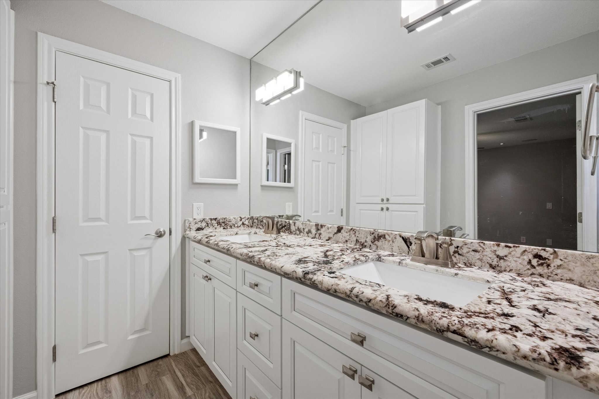 3830 Hansen Drive Dickinson, TX 77539 - Photo 12 of 21 Primary Bathroom with Double Sinks and Braazilian Granite Countertops