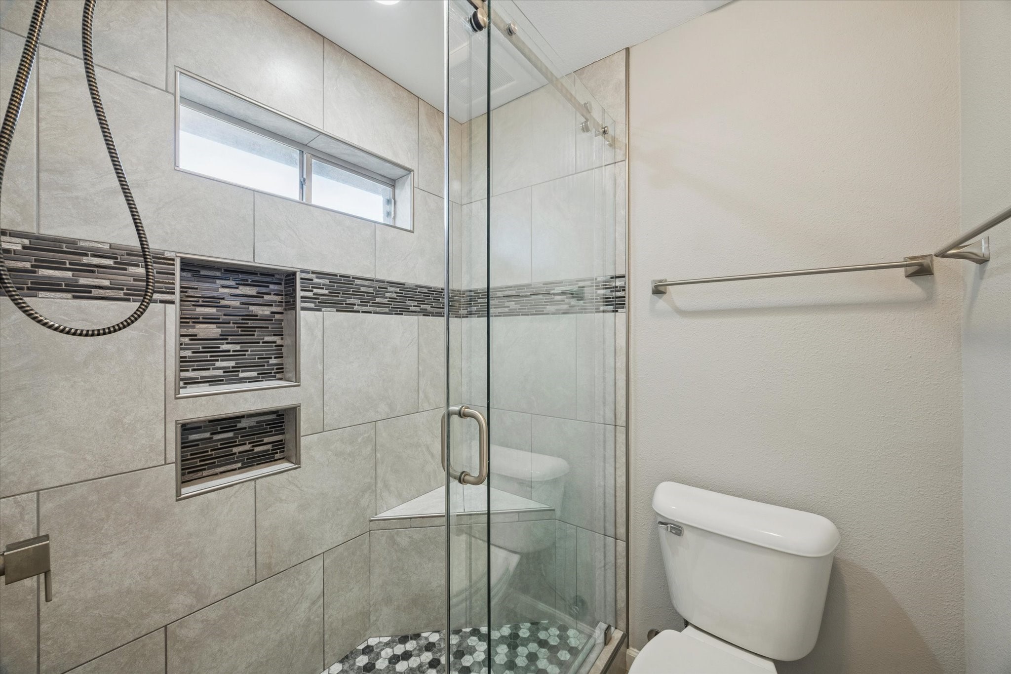 3830 Hansen Drive Dickinson, TX 77539 - Photo 13 of 21 Gorgeous Updated Bathroom with Shower Seating Featuring HighEnd Features