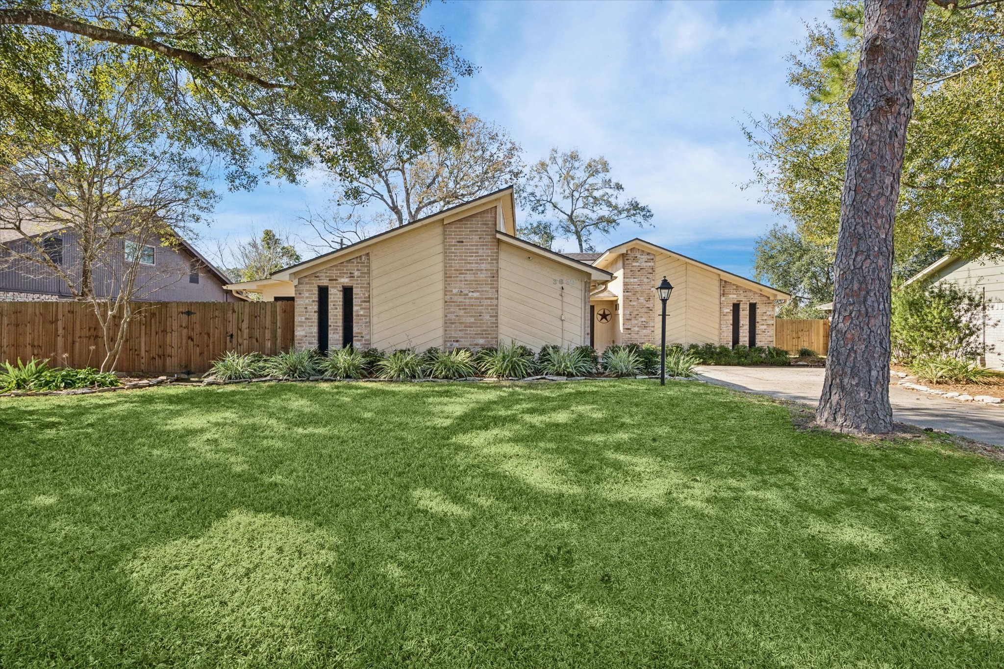 3830 Hansen Drive Dickinson, TX 77539 - Photo 2 of 21 Large Front Elevation with Gorgeous Trees!
