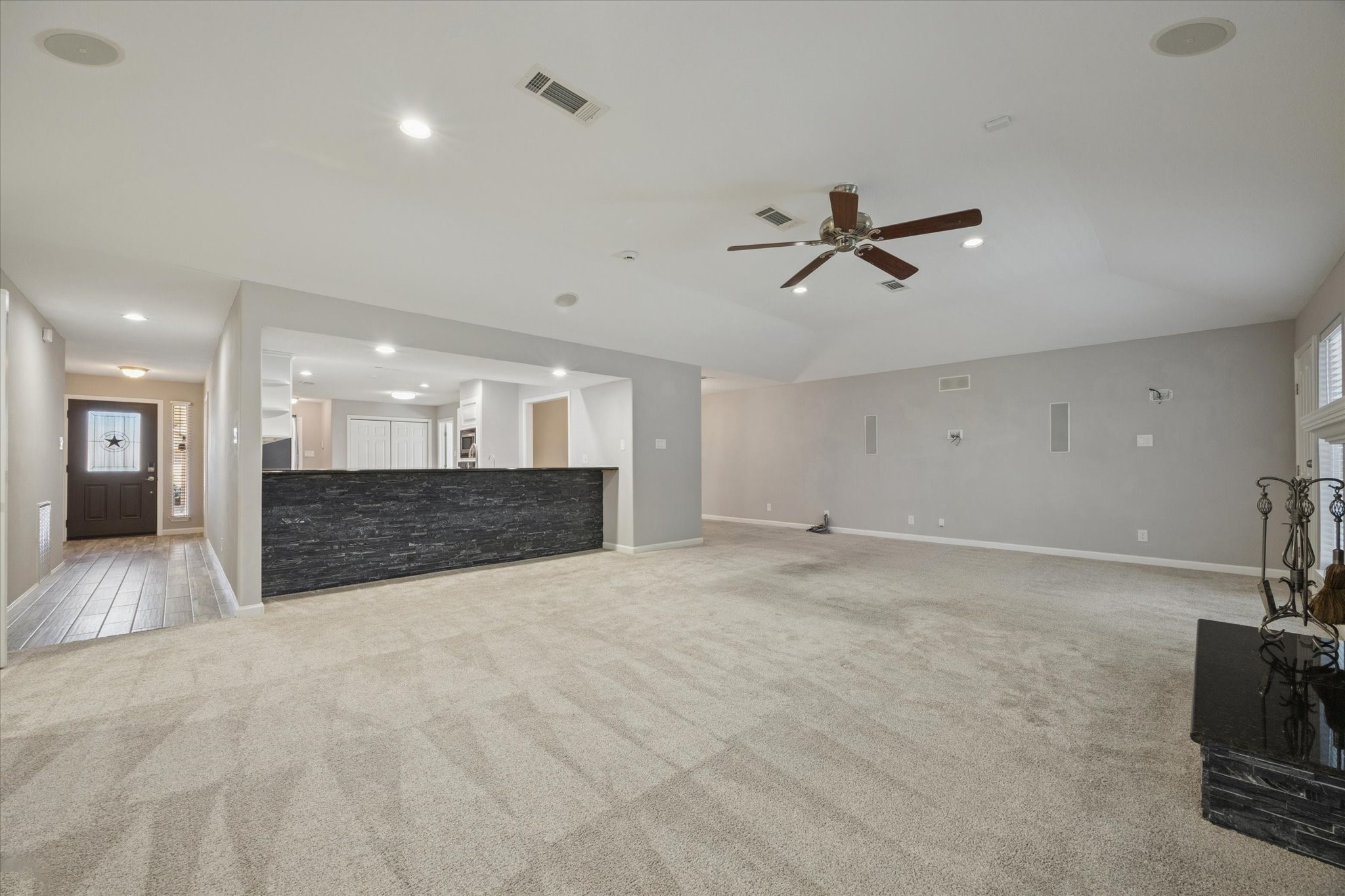 3830 Hansen Drive Dickinson, TX 77539 - Photo 7 of 21 View of Bar Seating From The Large Living Area - Surround Sound On Adjacent Wall For A Home Theatre Feel