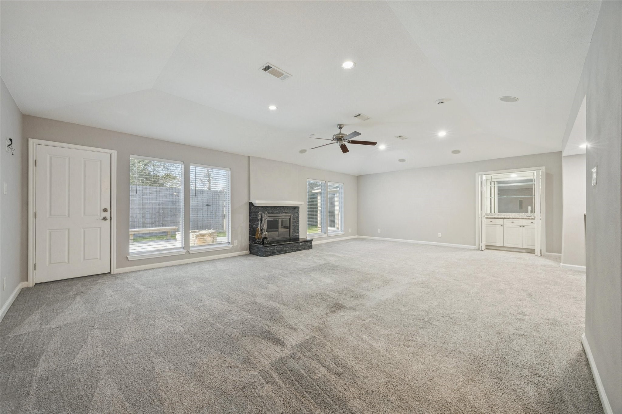 3830 Hansen Drive Dickinson, TX 77539 - Photo 8 of 21 HUGE Living Area with Wood Burning Fireplace