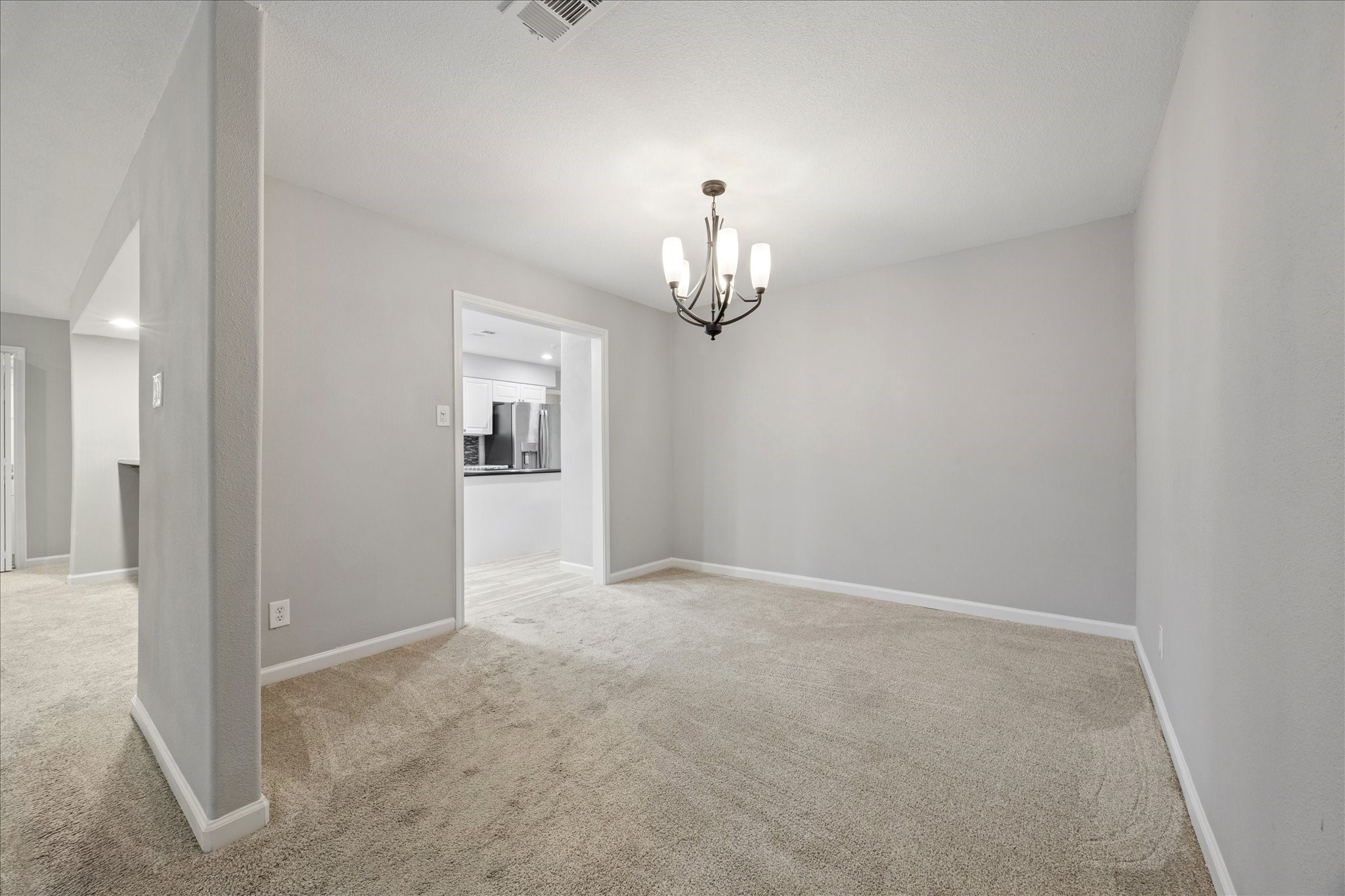 3830 Hansen Drive Dickinson, TX 77539 - Photo 9 of 21 Large Dining Area with Chandelier Lighting