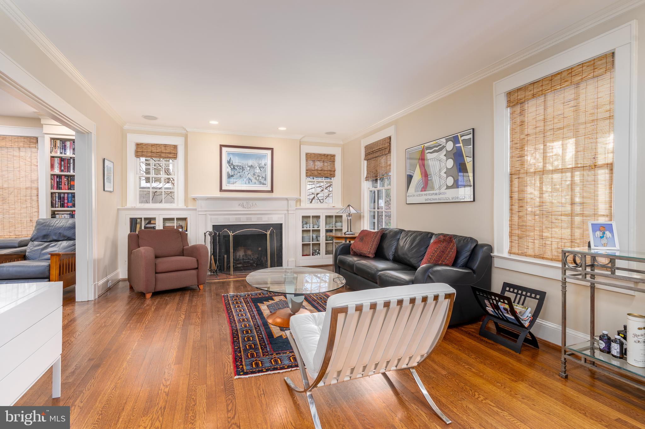 3415 Fulton Street Northwest Washington, DC 20007 - Photo 11 of 68 a living room with furniture large window and wooden floor