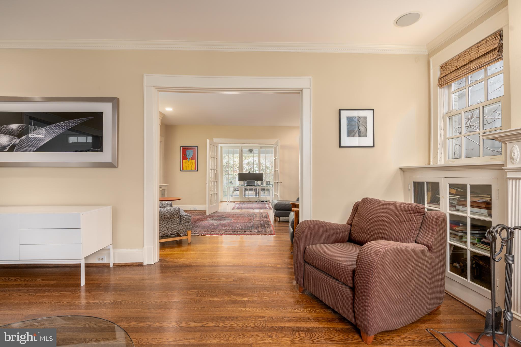 3415 Fulton Street Northwest Washington, DC 20007 - Photo 13 of 68 a living room with furniture a wooden floor and next to a window