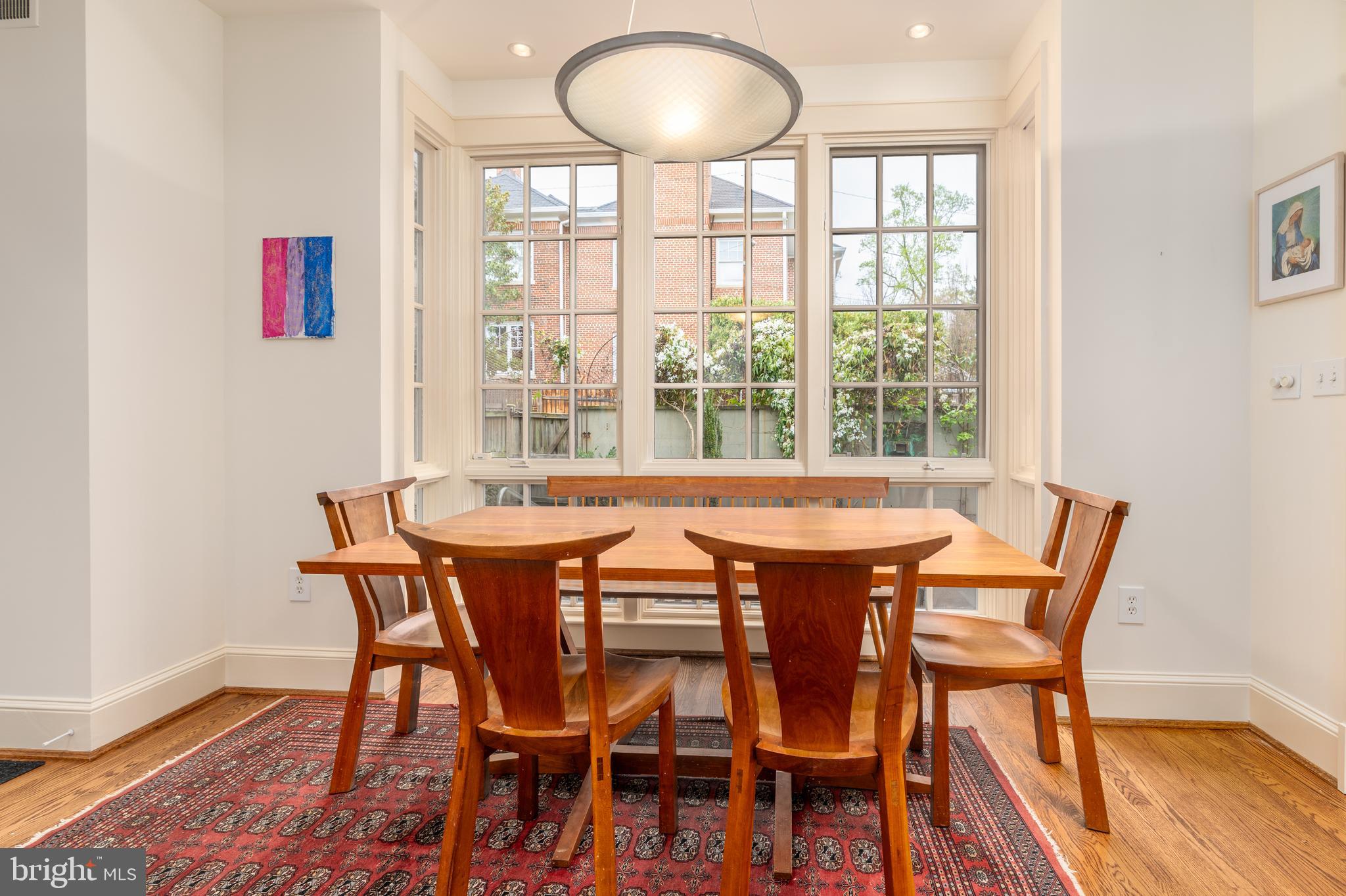 3415 Fulton Street Northwest Washington, DC 20007 - Photo 19 of 68 a dining room with furniture and wooden floor